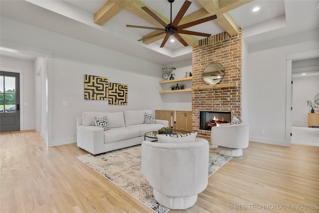 2048 E 128th Pl S, Jenks, OK 74037 - living room featuring coffered ceiling, light wood-type flooring, a ceiling fan, recessed lighting, and a brick fireplace