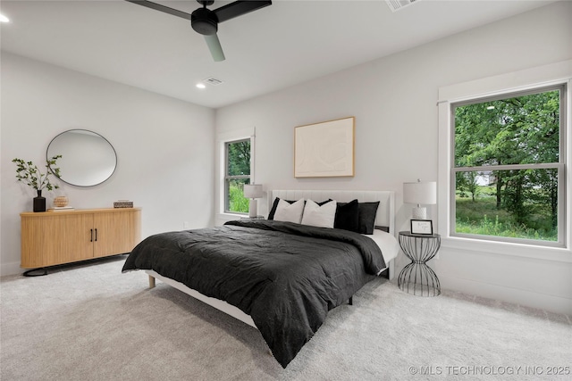 2048 E 128th Pl S, Jenks, OK 74037 - bedroom with light colored carpet, recessed lighting, and a ceiling fan