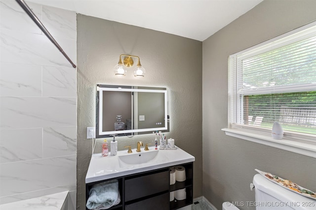 9667 E 27th St, Tulsa, OK 74129 - bathroom featuring vanity and toilet