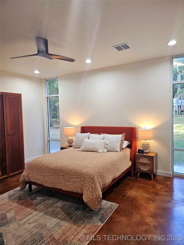 2417 Wilson St, Durant, OK 74701 - bedroom featuring recessed lighting, a ceiling fan, and finished concrete floors