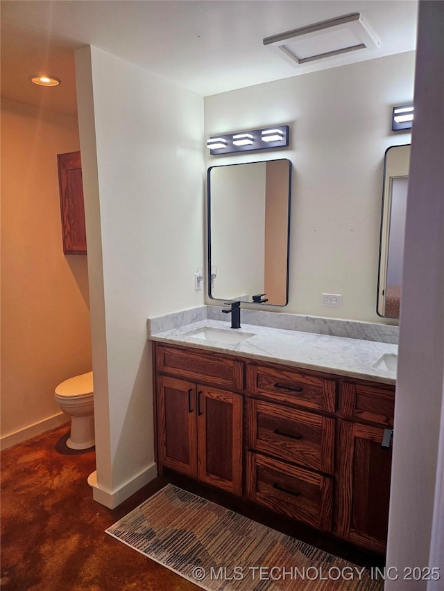 2417 Wilson St, Durant, OK 74701 - full bath with double vanity and concrete flooring