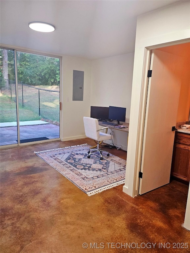 2417 Wilson St, Durant, OK 74701 - office space with electric panel, finished concrete floors, and floor to ceiling windows