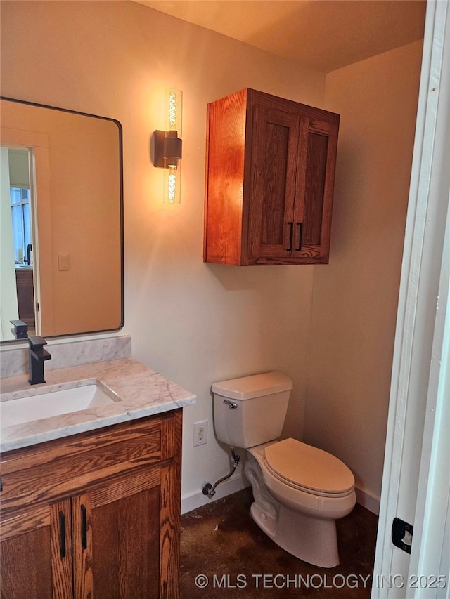 2417 Wilson St, Durant, OK 74701 - bathroom featuring toilet and vanity