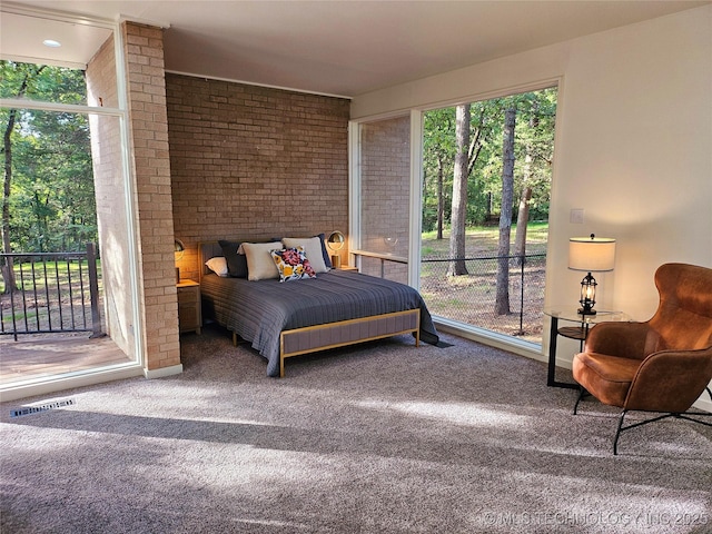 2417 Wilson St, Durant, OK 74701 - carpeted bedroom featuring access to outside