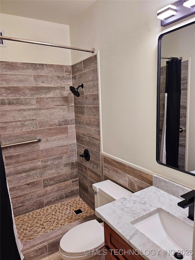2417 Wilson St, Durant, OK 74701 - bathroom featuring vanity and a tile shower