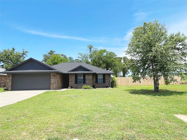 102 Northridge, Durant, OK 74701 - ranch-style home with a garage, concrete driveway, and brick siding