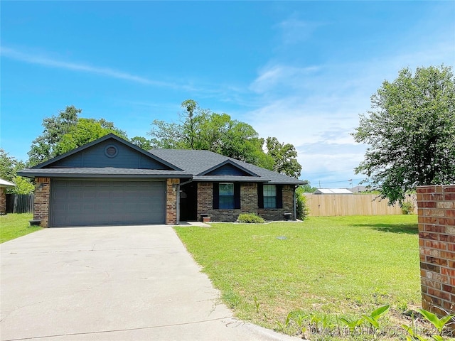 102 Northridge, Durant, OK 74701 - view of front of home with driveway and an attached garage