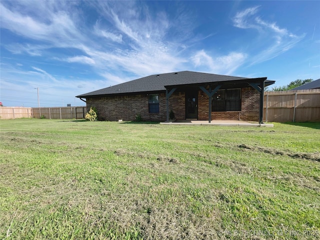 102 Northridge, Durant, OK 74701 - rear view of property featuring a patio area and brick siding