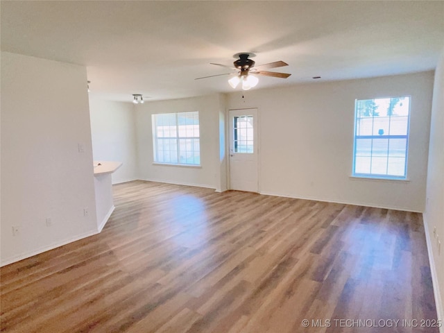 102 Northridge, Durant, OK 74701 - unfurnished room featuring wood finished floors and ceiling fan