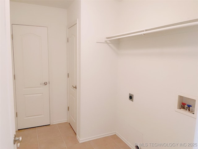 102 Northridge, Durant, OK 74701 - washroom with hookup for a washing machine, light tile patterned floors, and electric dryer hookup