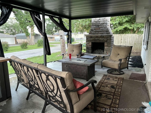 24 Lakeside, Adair, OK 74330 - view of patio / terrace featuring an outdoor stone fireplace