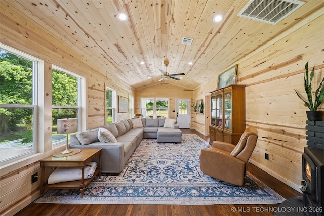 8620 N 155th Rd, Beggs, OK 74421 - living room featuring lofted ceiling, recessed lighting, plenty of natural light, wood walls, and wood finished floors