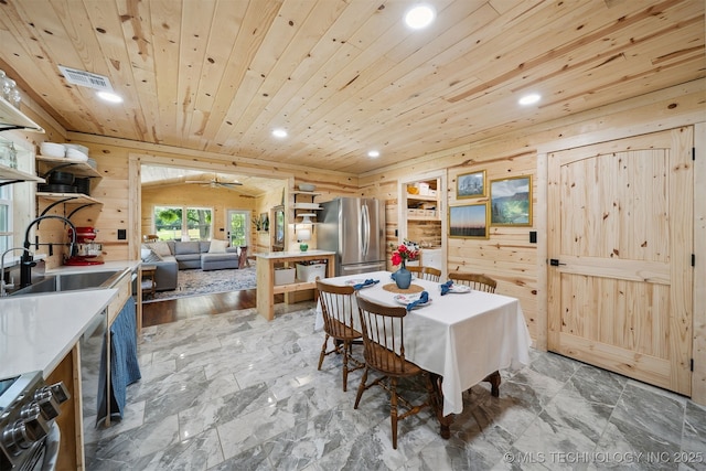 8620 N 155th Rd, Beggs, OK 74421 - dining room with wooden walls, recessed lighting, wood ceiling, and ceiling fan