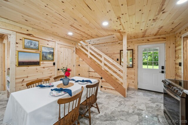 8620 N 155th Rd, Beggs, OK 74421 - dining area featuring wood walls, wooden ceiling, stairs, and recessed lighting