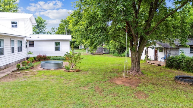8620 N 155th Rd, Beggs, OK 74421 - view of green lawn with an outdoor fire pit