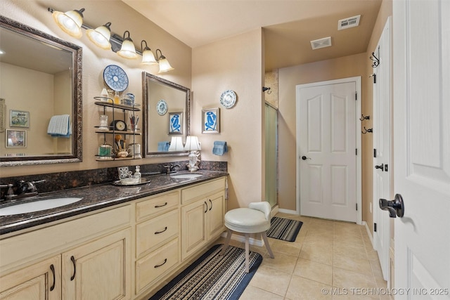 18 Longacre Dr, Ramona, OK 74061 - bathroom featuring a stall shower, tile patterned floors, and double vanity