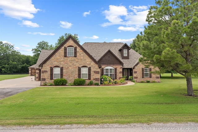 18 Longacre Dr, Ramona, OK 74061 - view of front of house with stone siding, a shingled roof, and a front lawn