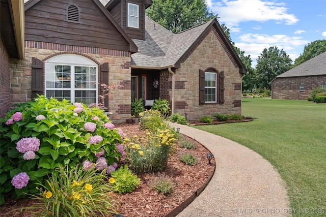 18 Longacre Dr, Ramona, OK 74061 - view of front facade featuring stone siding, a front yard, and a shingled roof