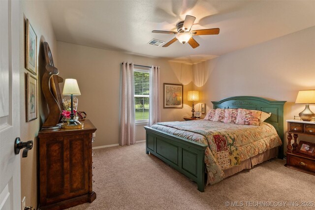 18 Longacre Dr, Ramona, OK 74061 - bedroom with light carpet and ceiling fan