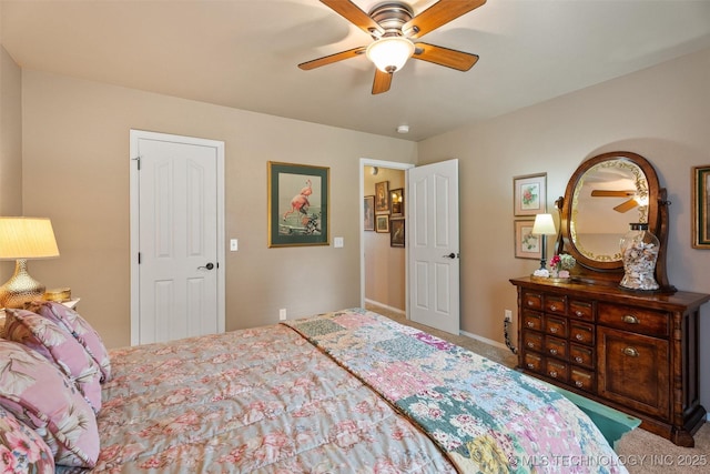 18 Longacre Dr, Ramona, OK 74061 - bedroom with carpet floors and a ceiling fan