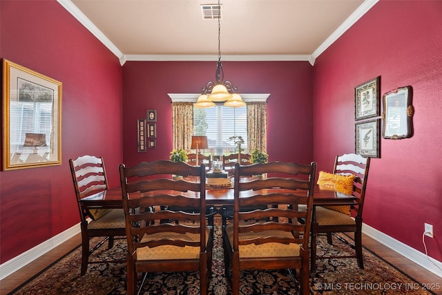 18 Longacre Dr, Ramona, OK 74061 - dining space featuring wood finished floors and crown molding
