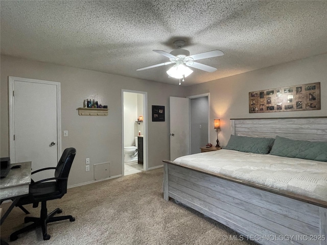 3800 S Narcissus Ave, Broken Arrow, OK 74011 - bedroom with light colored carpet, an office area, connected bathroom, a textured ceiling, and a ceiling fan