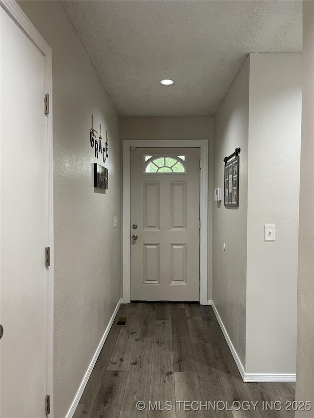 3800 S Narcissus Ave, Broken Arrow, OK 74011 - doorway with wood finished floors, a textured ceiling, and recessed lighting