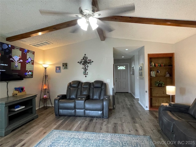 3800 S Narcissus Ave, Broken Arrow, OK 74011 - living area with a ceiling fan, wood finished floors, and a textured ceiling
