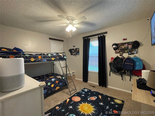 3800 S Narcissus Ave, Broken Arrow, OK 74011 - carpeted bedroom featuring a textured ceiling and a ceiling fan