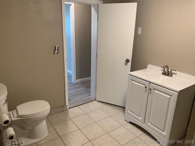 8201 State Highway 20, Eucha, OK 74342 - half bathroom featuring vanity and tile patterned floors