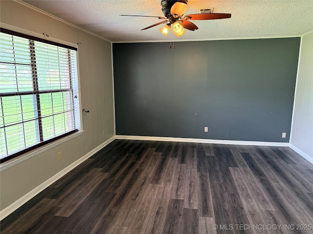 303 N 6th, Calera, OK 74730 - spare room featuring crown molding, a textured ceiling, wood finished floors, and ceiling fan