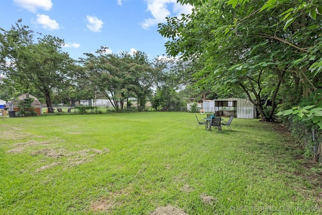 707 Bradwell St, Colbert, OK 74733 - view of yard with an outdoor structure