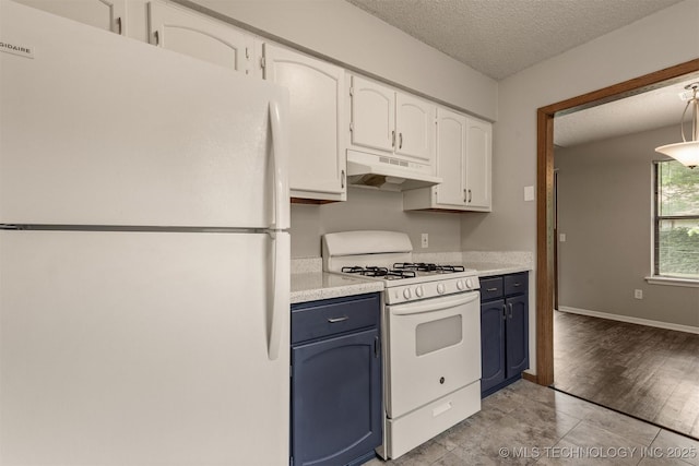 9207 S 92nd E Ave, Tulsa, OK 74133 - kitchen featuring white appliances, under cabinet range hood, blue cabinets, white cabinetry, and light countertops
