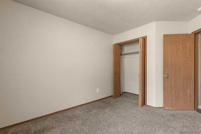 9207 S 92nd E Ave, Tulsa, OK 74133 - unfurnished bedroom featuring carpet floors, a textured ceiling, and a closet