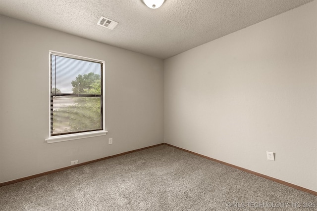 9207 S 92nd E Ave, Tulsa, OK 74133 - unfurnished room featuring carpet floors and a textured ceiling