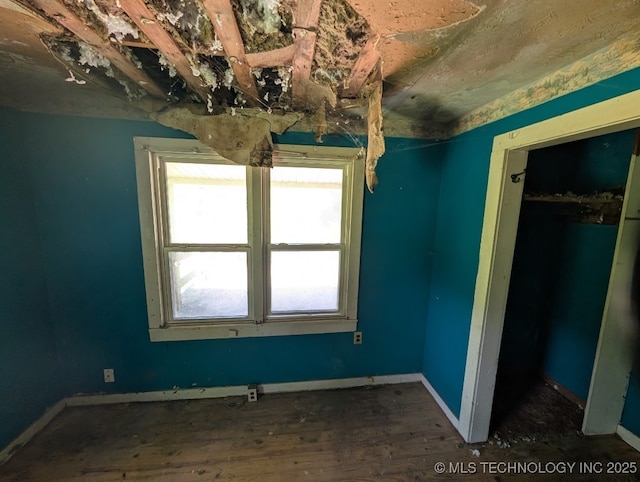 468446 E 908th Rd, Bunch, OK 74931 - unfurnished bedroom with baseboards
