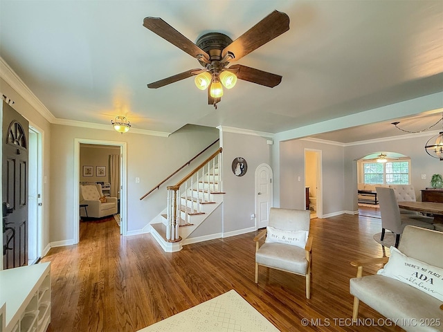 1312 S Oak, Ada, OK 74820 - entryway with stairs, wood finished floors, crown molding, and ceiling fan