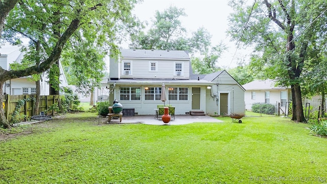 1312 S Oak, Ada, OK 74820 - rear view of property with a patio, a fenced backyard, and entry steps