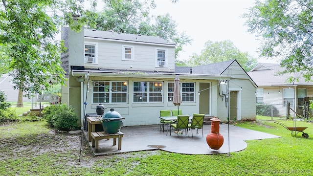 1312 S Oak, Ada, OK 74820 - back of house with a chimney and a patio area