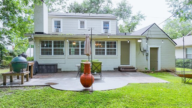 1312 S Oak, Ada, OK 74820 - back of house featuring entry steps, a chimney, and a patio area