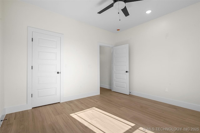 150 Chateau Bnd, Ardmore, OK 73401 - unfurnished bedroom featuring wood finished floors, a ceiling fan, and recessed lighting