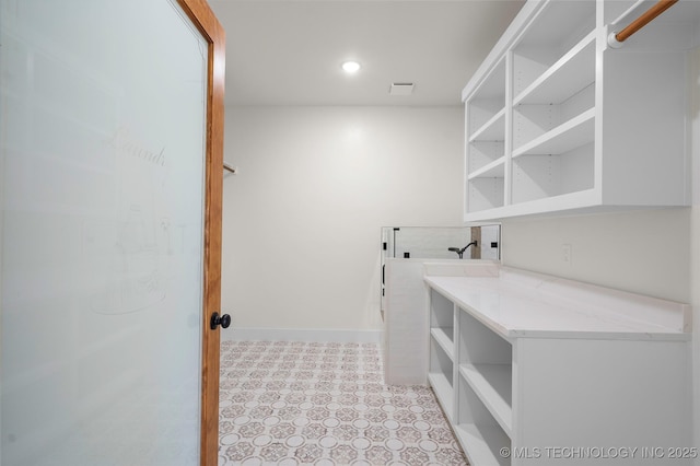 150 Chateau Bnd, Ardmore, OK 73401 - laundry area featuring light floors and recessed lighting