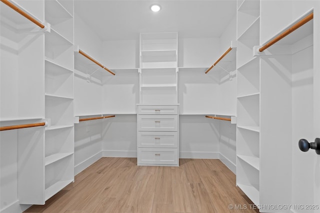 150 Chateau Bnd, Ardmore, OK 73401 - spacious closet with light wood finished floors