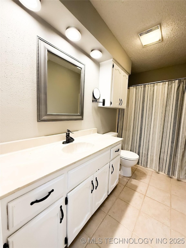2802 Georgia, Muskogee, OK 74403 - full bathroom with vanity, tile patterned flooring, a textured ceiling, and a shower with curtain