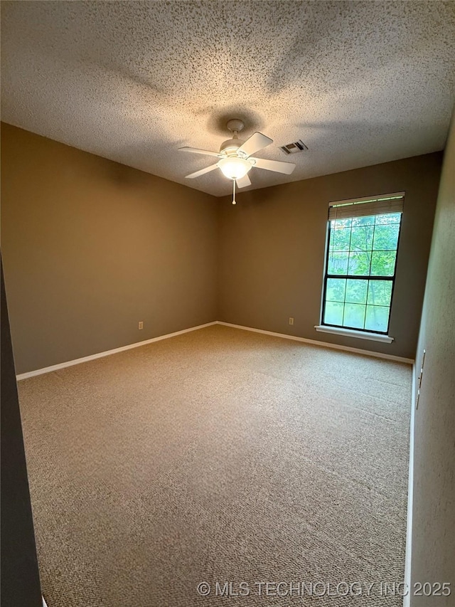 2802 Georgia, Muskogee, OK 74403 - carpeted empty room with a ceiling fan and a textured ceiling
