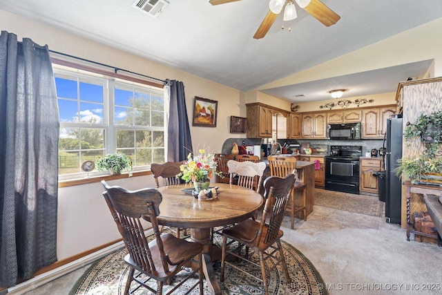 447247 E 70th Rd, Welch, OK 74369 - dining room featuring ceiling fan, vaulted ceiling, and light colored carpet