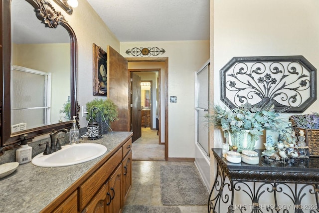 447247 E 70th Rd, Welch, OK 74369 - full bath featuring vanity and a textured ceiling