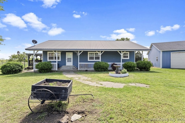 447247 E 70th Rd, Welch, OK 74369 - view of front of home with covered porch, a metal roof, and a front lawn