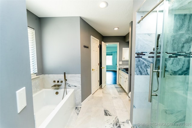 7224 NW 102nd, Oklahoma City, OK 73162 - full bath with a garden tub, vanity, a shower stall, marble finish flooring, and recessed lighting