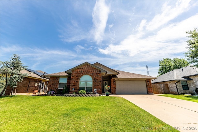 7224 NW 102nd, Oklahoma City, OK 73162 - view of front of property featuring brick siding, an attached garage, and driveway